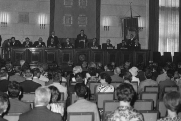ICTP inauguration ceremony, 1972 A black of white photo of a hall filled with people facing a long podium where important guests of honour are sat.