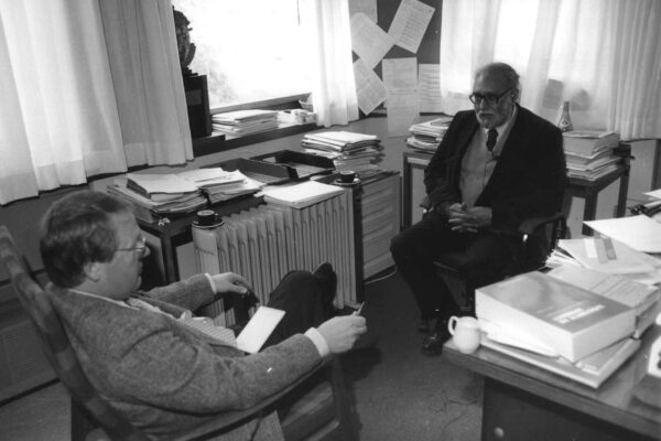 Salam, interviewed in his ICTP office, 1986 Abdus Salam being interviewed in his office at the ICTP. The interviewer sits opposite Salam, surrounded by the paperwork and books in Salam's office. Amongst the busy interior, one can spy two cappuccino cups, perched on top of a radiator next to where Salam and the interviewer are talking.