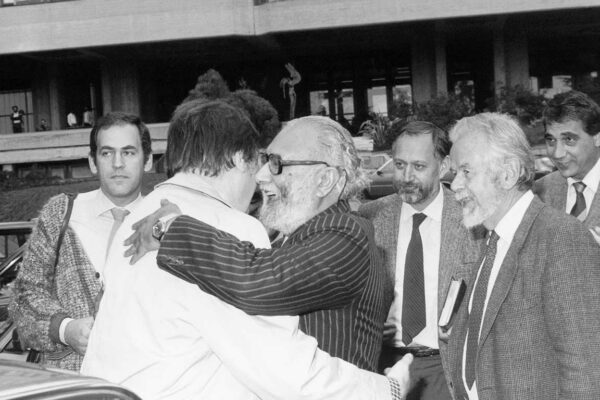 Salam congratulating 1984 Nobel Prize winner, Carlo Rubbia, 1984 Abdus Salam congratulating Physicist Carlo Rubbia on receiving the 1984 Nobel Prize. They embrace and laugh.