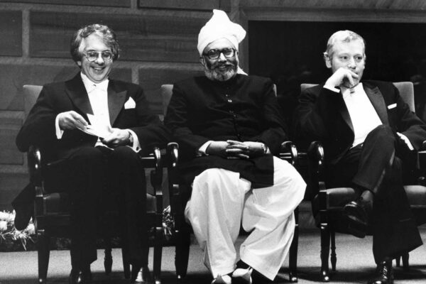 Nobel Prize ceremony, 1979 Abdus Salam wearing a traditional shervani and turban at a Nobel Prize award ceremony. He is sat next to Glashow (left) and Weinberg (right).